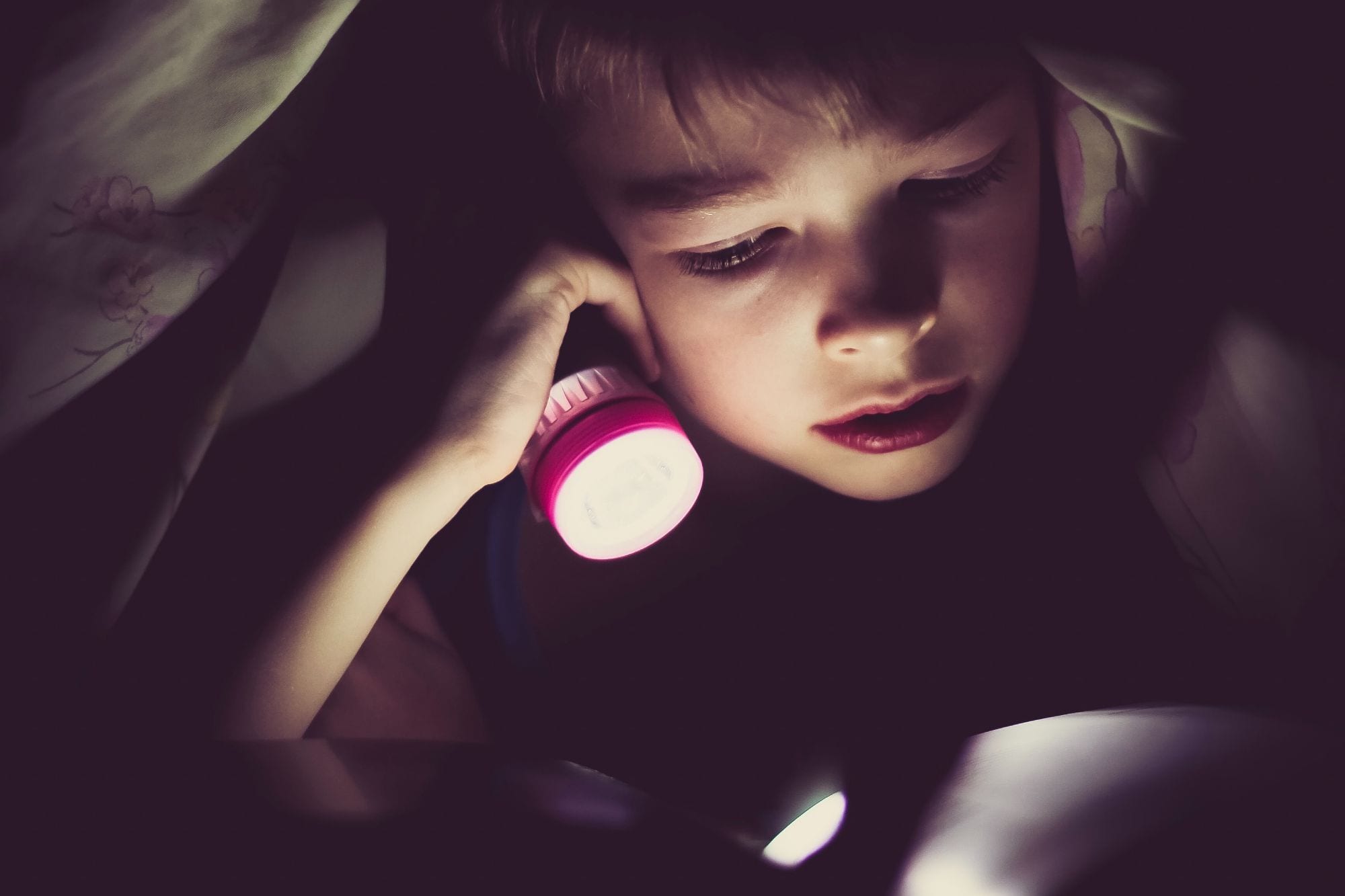 Child reading food allergy books for kids